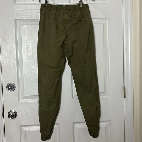 Nike Men's Swoosh Cuffed Joggers Olive green size Medium - Picture 2 of 11